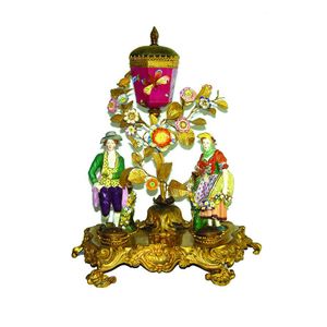 A mid-19th century European porcelain and ormolu fancy figured…