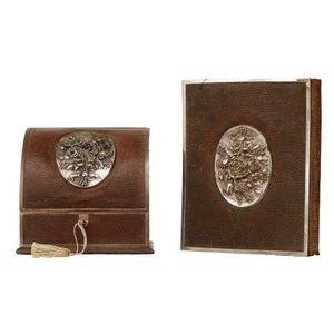 A sterling silver mounted leather desk set by grey & Co,…
