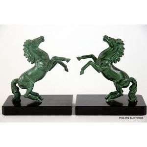 A pair of Art Deco spelter rearing horse book ends, circa 1920s,…