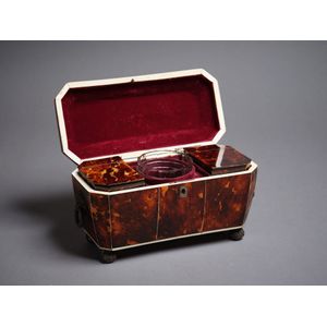 A Regency period tortoise shell tea caddy, with ring side…