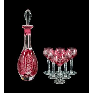 Bohemian cut crystal decanter. With six matching goblets. Ruby…