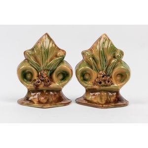 A pair of Bosley ware bookends, each of Fleur-de-lis style form…