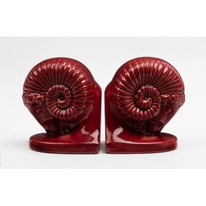A pair of merino sheep bookends potter unknown, circa 1930,…