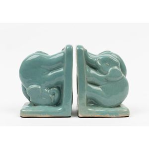 A pair of elephant bookends potter unknown, circa 1920, each…