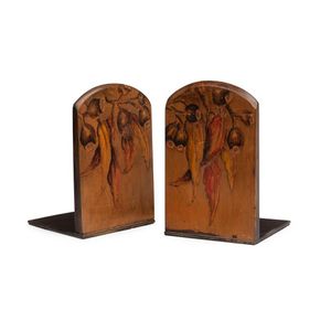A pair of pokerwork decorated Huon pine bookends, circa 1920,…