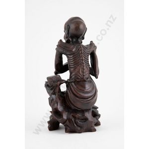 Japanese carved hardwood figure, of a sage seated holding&hellip;