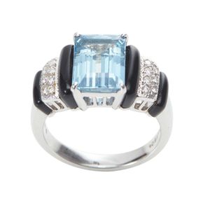 An aquamarine, onyx and diamond ring by Mikimoto, featuring an…