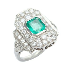 An emerald and diamond ring, the large octagonal plaque…