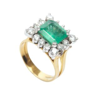 An emerald and diamond ring, featuring a square emerald cut…