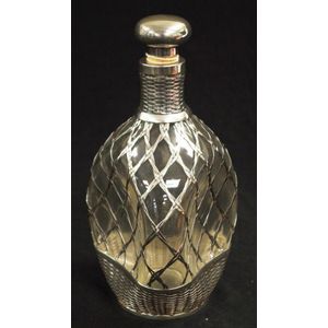 Silver encased glass spirit decanter marked 'silver 950,' to…