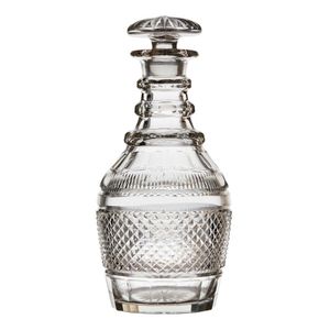 A large Irish Georgian cut glass decanter, mallet shaped with…
