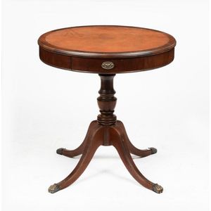 A George III style leather top drum table 74 cm high, 71 cm…
