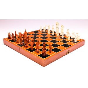 Chess pieces: 32 red and white ivory pieces without board., Complete number  of pieces of a chess game. Sixteen cut ivory pieces that have been made red  with a dyestuff: these are