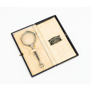 A pair of enamelled handled lorgnette in a Coles & Garrard case