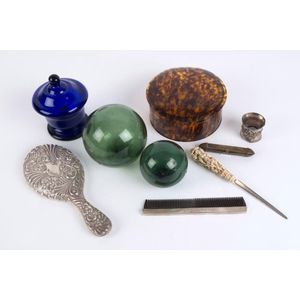 Collar box, letter opener, hand mirror, comb, cigar case, glass…