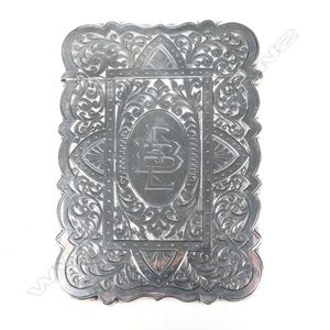 A Victorian silver card case, the exterior with profuse…