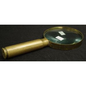 Trench art magnifying glass with 2 0 mm M57shell casing handle