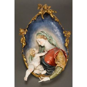 Italian Madonna and Child plaque, of oval form, depicting…