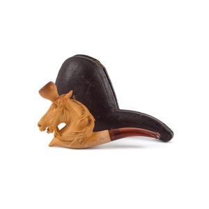 An Austro-Hungarian horse head carved meerschaum pipe in plush…