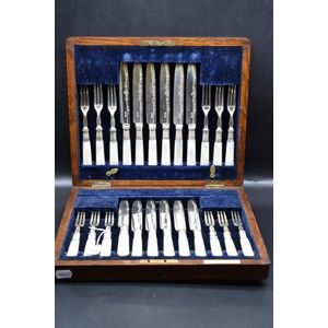 Silver plate twelve person dessert set with mother of pearl…