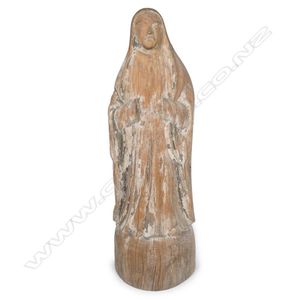 A carved wood statuette of the Virgin Mary, probably Hispanic…