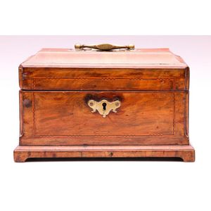 An antique walnut tea caddy with banded inlay, width 24 cm