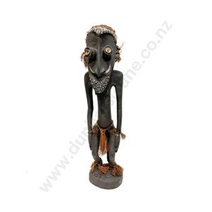 New Guinea tribal artefacts, carved figures - price guide and values