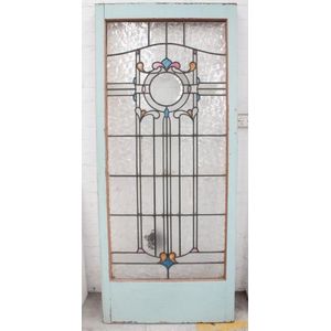 A leadlight Art Nouveau (?) glass door in frame, 203 x 86 cm in…