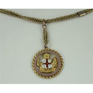 An antique gold fob chain and medallion, fancy double curb link…