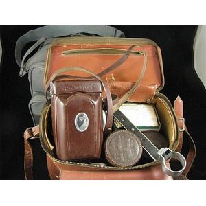 A collection of vintage cameras including a Rolleiflex and…
