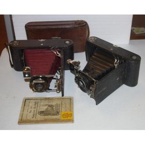 Two vintage Kodak cameras, with one case and one set of…