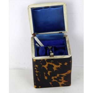 A Regency tortoiseshell etui, the box enclosing sewing…