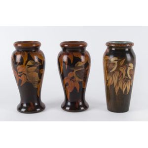 Three pokerwork kookaburra vases, circa 1930, the tallest 20.5…