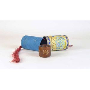 A carved horn archers ring with silk needlework case engraved…