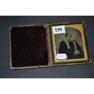 Vintage daguerreotypes in leather presentation case