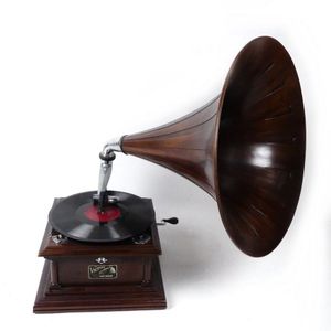 An old Victor table-top phonograph, with winder and original…