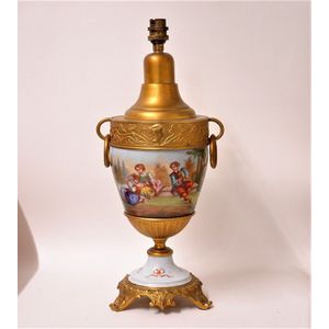 A 20th century European porcelain and ormolu classical lamp…