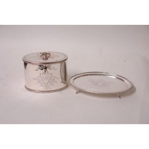 A 19th century silver plate tea caddy and teapot stand, the…