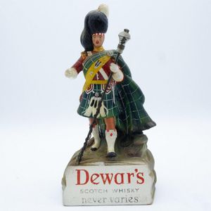 Dewar's Scotch Whisky Never Varies advertising figure
