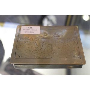 Brass cigarette box decorated with a figure of a greyhound,…