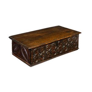 A carved oak panelled deed box, English, late 17th century, 23…