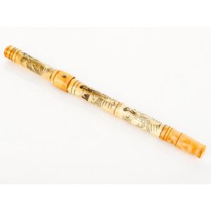 Carved ivory pipe, with figural decoration across body,…