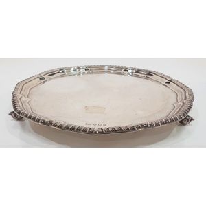 An Elizabeth II silver salver, with gadrooned shaped border,…