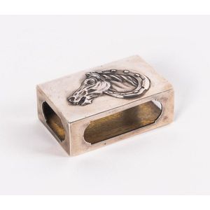 A Russian silver match box holder embossed with a horse head…