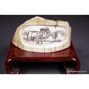 A piece of engraved mammoth ivory, the fossilised ivory carved…