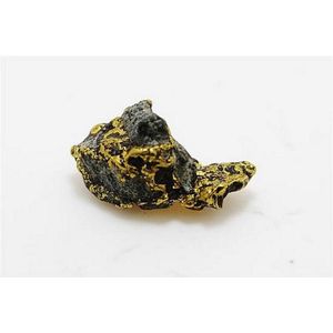 A gold nugget, Imbedded in rock, tests as 24ct. Total weight…