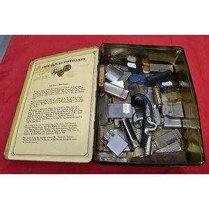 Large collection of vintage lighters in Jack Daniels tin box