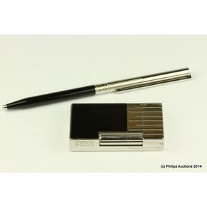 A Dupont lighter and pen, each boxed in original packaging,…
