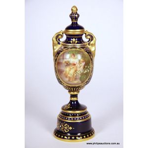 A signed Vienna porcelain covered urn, circa 1880-90, signed…