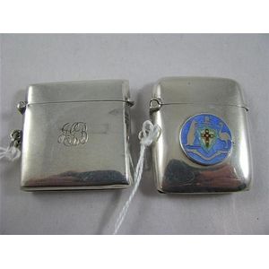Two small sterling silver vesta cases, (2) the first plain /…